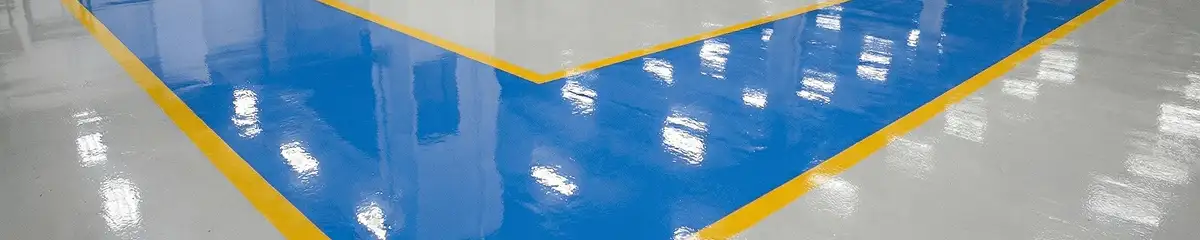 A factory floor professionally covered and marked with epoxy flooring in Erie, PA