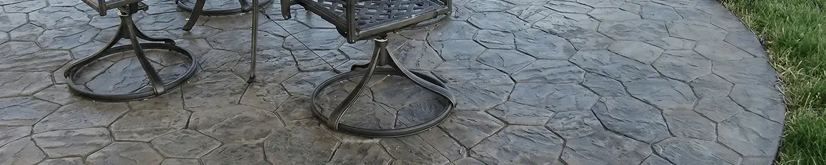 Garden relaxation area with professionally installed stone flooring in Erie PA