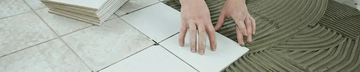 Professional installing white tile floors in Erie, PA