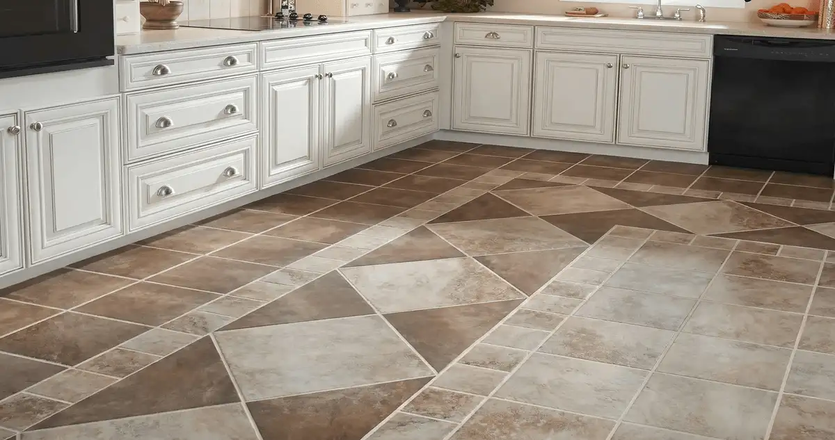 Kitchen with white cabinets and a professionally installed tile floor in Erie, PA