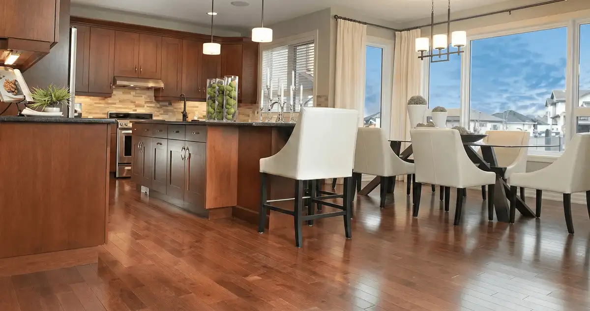 A modern kitchen with professionally installed wood flooring in Erie, PA
